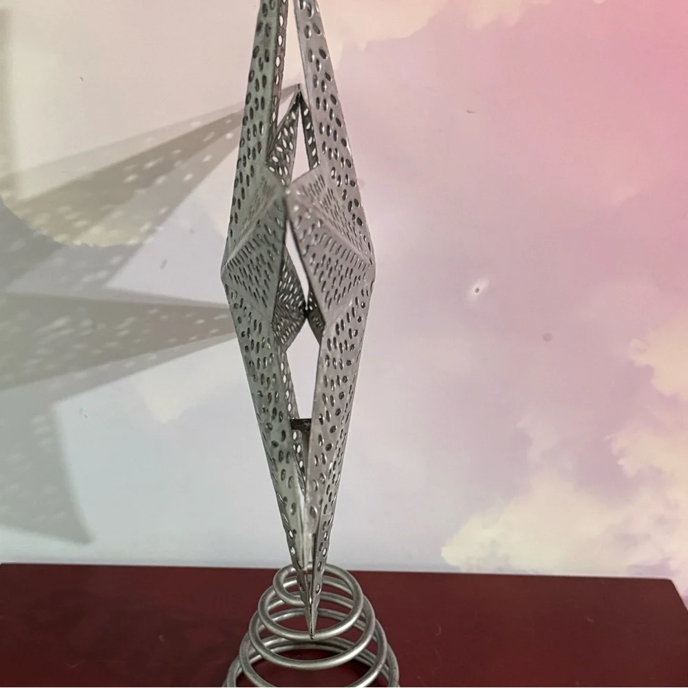 Silver Star Tree Topper Eight-point 3D star with intricate punch-work
